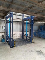 Nouvelle plateforme élévatrice verticale hydraulique à rail de guidage avec palan à chaîne pour le levage de marchandises