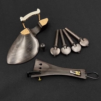 Ensemble d'accessoires pour violon 4/4 en ébène naturel - Comprend un repose-menton, des chevilles, une cordière, une patte arrière et un cordon de queue