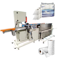 Machine de découpe semi-automatique pour serviettes de cuisine, avec fonction de refendage et de refoulement, et scie à ruban pour la découpe du papier et des rouleaux