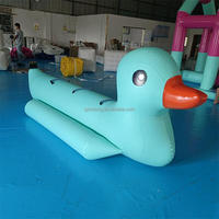 Bateau gonflable commercial en forme de canard pour parc aquatique, loisirs aquatiques en groupe et divertissement en plein air