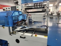 Machine de scellage automatique à tunnel thermique à grande vitesse pour film plastique, idéale pour les boissons, les vêtements et les produits chimiques (certifiée CE)