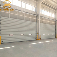 Fabricant de portes de levage isolées pour entrepôts, porte sectionnelle industrielle avec serrure de sécurité, porte automatique à ouverture par le haut pour atelier