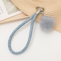 Porte-clés en cuir avec pompon en peluche pour l'automne/hiver, pendentif décoratif pour sac, ornement suspendu, sangle pour téléphone portable