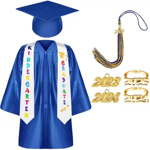 Uniformes de graduación de jardín de infantes para niños de tela brillante, vestidos y gorras con certificación de borla para uniforme preescolar