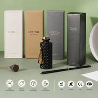 Diffuseurs à roseaux sans flamme de luxe en verre noir 150 ml avec pompons classiques et huiles essentielles végétales naturelles