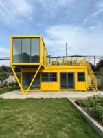Maison préfabriquée jaune à 2 étages, maison modulaire moderne, balcon, salon/bar/boutique/bureau/airbnb/café en plein air