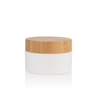 Pot en plastique PP de 20 ml, 50 ml, 100 ml, 150 ml avec couvercle en bambou pour emballage cosmétique de crème pour les yeux et crème, couleur personnalisée, vente en gros