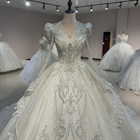 Robe de mariée élégante blanche DW0041, nouvelle arrivée, robe de bal à manches longues, lourdement ornée de sequins, de perles, de dentelle et de cristaux.