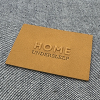 Étiquettes en cuir véritable personnalisées de haute qualité, écologiques, avec logo personnalisé en relief, étiquettes en cuir PU pour chapeaux