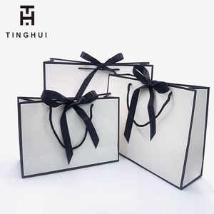 Bolsas de Papel para Regalo al por Mayor con Asas, Bolsas de Papel para Compras con Asas de Cuerda y Logotipo Personalizado - Product Image 1