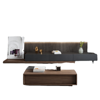 Meuble TV en bois contrasté noir et blanc avec rangement spacieux, tiroirs sans poignées, et table basse contemporaine – Ensemble moderne pour salon