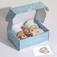 Boîtes d'emballage de luxe pour les fêtes, personnalisables avec logo, pour l'expédition de cadeaux saisonniers haut de gamme et la promotion de marques.
