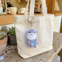 Porte-clés en peluche 3D mignon et doux, en forme de castor ou de loutre marine tenant une poisson, breloque de sac, poupée pour machine à griffes