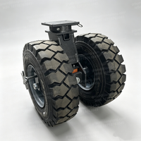 Roue pivotante pneumatique double robuste de 22 pouces avec frein, capacité de charge de 11 tonnes, absorption des chocs, fonctionnement silencieux pour terrains accidentés