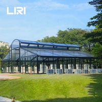 Tentes de réception de luxe pour 100 invités, avec structure noire circulaire, en verre, type serre, marquise, orangerie ou atrium, pour mariages et événements