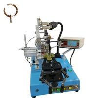 Machine automatique d'enroulement de bobines d'inducteurs de transformateurs à noyau toroïdal
