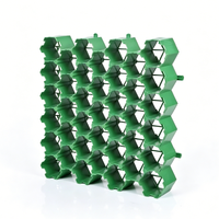 Grille alvéolée en PEHD Taurus Factory Direct pour stabilisation de gravier industriel, parking et aménagement extérieur vert