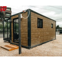 Entièrement mis à niveau personnalisé grain de bois luxe toboggan petites maisons verre modulaire prêt à l'emploi extensible conteneur maison grand-mère plat