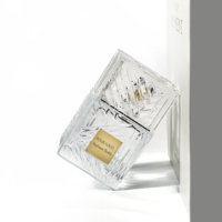 Boîtes à cosmétiques rectangulaires Bouteilles de parfum en verre gaufré uniques de haute qualité Bouteilles d'huile d'olive en gros Parfum vide