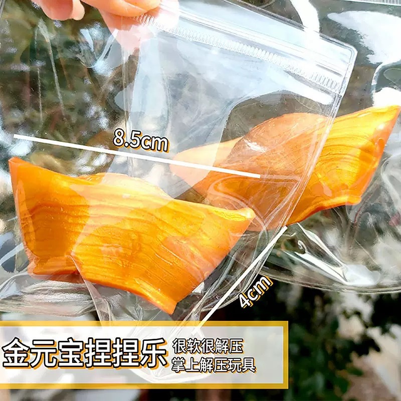 Juguete para apretar lingotes de oro