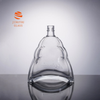 Bouteille en verre de brandy XO de grande capacité de 1000 ml avec un design ondulé, bouteille en verre adaptée à la personnalisation