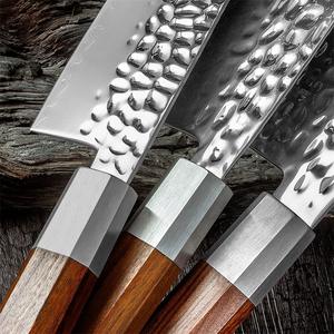 <span class=keywords><strong>Couteau</strong></span> <span class=keywords><strong>de</strong></span> <span class=keywords><strong>chef</strong></span> <span class=keywords><strong>Santoku</strong></span> japonais <span class=keywords><strong>de</strong></span> 7 pouces 9Cr18 Couteaux <span class=keywords><strong>de</strong></span> cuisine super pointus 3 couches en acier composite martelé Design moderne - Product Image 3