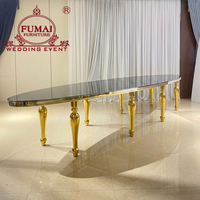 Grandes tailles personnalisées populaires ensembles de table et de chaises ovales en verre trempé noir pour événements de fête