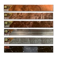 Carrelage de sol de bordure de mur en Chine, décoration de coin de mur, carrelage de plinthe brillant émaillé noir doré argenté