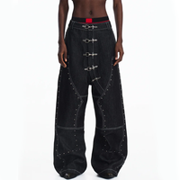 Jeans en denim brut lourd avec rivets en forme d'aile d'avion, style streetwear