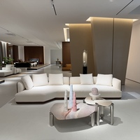 Table basse moderne en pierre irrégulière avec pieds en acier inoxydable, table centrale de luxe en marbre avec motif tourbillon gris crème pour salon