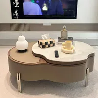 Table basse rotative en forme de pétale, style moderne minimaliste, luxe léger, haut de gamme, nouvelle collection, pour salon.