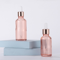 Flacon compte-gouttes en verre rose or rose translucide personnalisé huile essentielle vide 5ml 100ml tailles de bouchon compte-gouttes pour huile essentielle personnalisée
