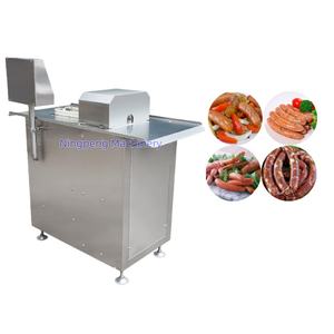 Equipo automático <span class=keywords><strong>de</strong></span> atado <span class=keywords><strong>de</strong></span> cuerdas <span class=keywords><strong>de</strong></span> carne <span class=keywords><strong>de</strong></span> marca NP para Factor <span class=keywords><strong>de</strong></span> procesamiento <span class=keywords><strong>de</strong></span> alimentos Equipo automático <span class=keywords><strong>de</strong></span> atado <span class=keywords><strong>de</strong></span> cuerdas <span class=keywords><strong>de</strong></span> carne - Product Image 1