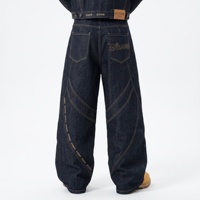 Jean Homme DIZNEW Bleu Foncé en Denim Épais avec Empiècements Géométriques Effet Ballon, Coutures Contrastantes Dorées, Motifs Totemiques et Runes, Impression Laser DIZNEW, 5 Boutons