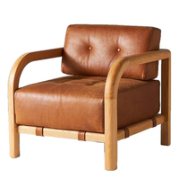 Massivholzrahmen Anpassbarer Moderner Akzentstuhl Beiges PU-Leder Kissen Gebogene Armlehne Wohnzimmer Einzelner Freizeitsitz Möbel