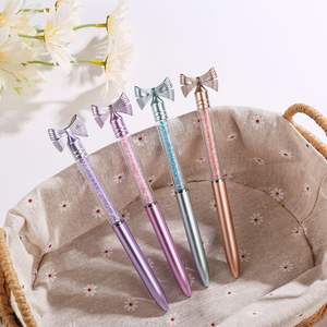 Stylo à bille rotatif avec nœud papillon créatif, stylo diamant avec signature pour fille mignonne, cristal d'huile et sable liquide - Product Image 2