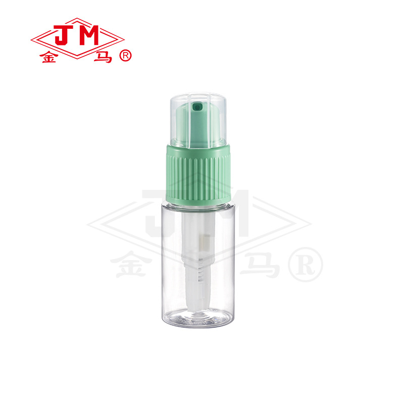 Tapa verde con botella transparente.