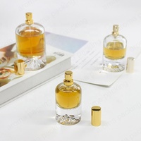 Flacon pulvérisateur unique à fond épais, flacon de parfum rond 30ml 50ml 100ml, flacon de parfum en verre de forme ronde en pierre volcanique
