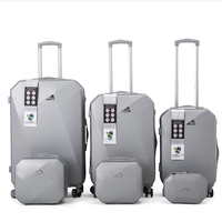 Valise à roulettes ABS PC de luxe nouveau style unisexe ensembles de valises rigides durables en gros