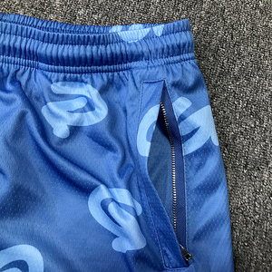 Short de basket-ball personnalisé de haute qualité pour hommes respirant et imprimé pour l'entraînement en club et les sports - Product Image 4