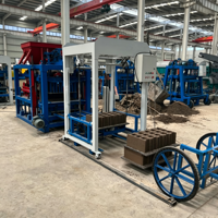 Machine automatique à briques de ciment par vibration QTJ4-25 pour la fabrication de blocs creux en béton et de pavés