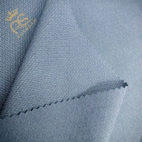 Tissu tissé extensible uni 100+40D DOBBY 100% Polyester 130 g/m² imperméable, respirant et écologique pour rideaux, vêtements et voitures