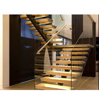 Escalier moderne standard australien et canadien avec marches en bois et verre pour intérieur