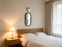 Miroir d'appoint ovale moderne, verre argenté, cadre en métal noir avec base ajourée, miroir décoratif pour chambre à coucher et salon