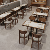 Ensemble de mobilier commercial en cuir pour hôtel, café, restaurant : banquette demi-courbe, table et chaises en marbre