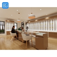 Aménagement intérieur de magasin sur mesure en matériaux recyclés, solution d'aménagement de magasin, présentoir rotatif pour lunettes
