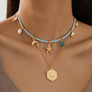 Collar Bohemio de Concha Marina con Circonita, Inspirado en la Costa, Chapado en Oro de 18K, Resistente al Agua - Product Image 1