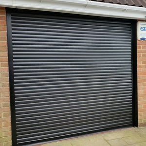 Porte à enroulement électrique en acier fini industriel 2025, pliable, avec un design <span class=keywords><strong>moderne</strong></span> pour une utilisation intérieure/extérieure dans les villas et les garages - Product Image 1
