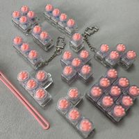 Porte-clés testeur de commutateurs multi-spécifiques en forme de patte de chat, jouet anti-stress en silicone en forme de patte, gadget de poche anti-stress en gros