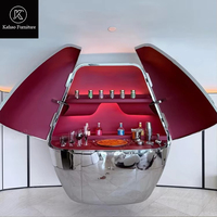 Meuble bar futuriste en acier inoxydable en forme d'œuf, armoire à liqueur LED de luxe pour villa, mobilier d'intérieur haut de gamme sur mesure